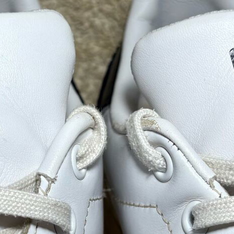 Adidas Stan Smith sneakers used, white with blue details, size 46.5