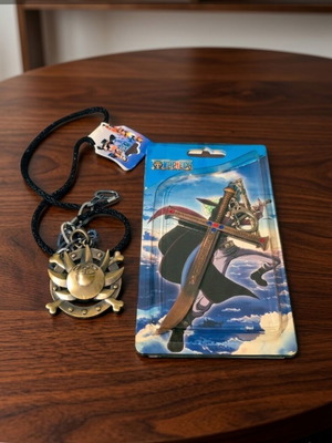 One Piece collectibles Mihawk's sword and Sunny necklace new