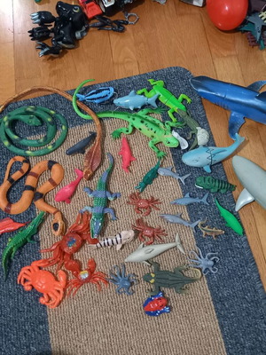 Animal figures like new, snakes, crocodiles, sharks, crabs