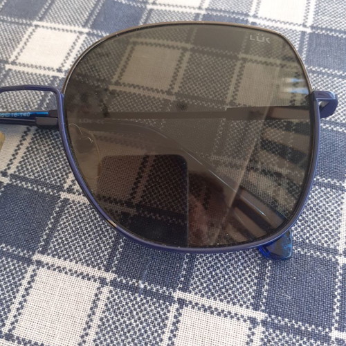 Sunglasses used in blue shade with metal frame
