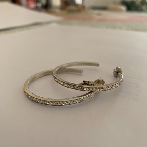 Folli Follie earrings with small wear