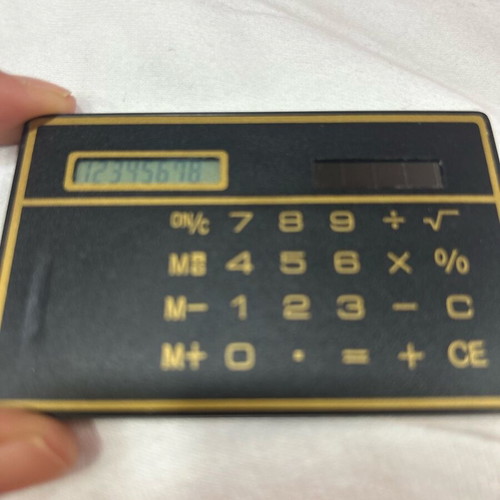 Ultra Thin Calculator with Touchscreen and Solar Power, Like New