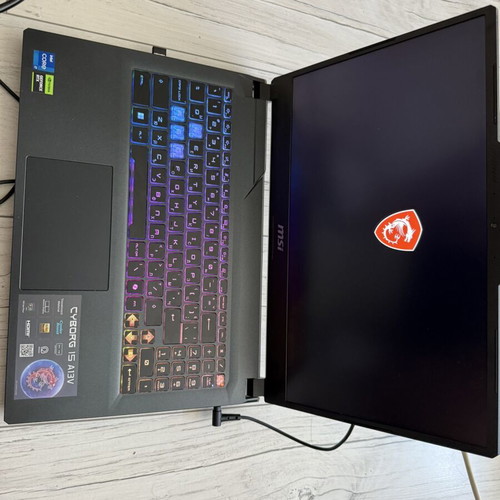 MSI Cyborg 15 A13V laptop like new with mouse and headphones
