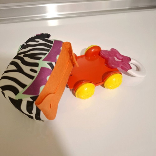 Luna fabric animal with wheels and teether star like new