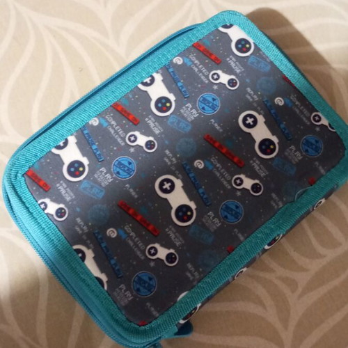 Must pencil case like new with Play Station controller theme and keychain
