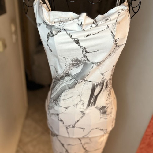 Mini dress with marble print like new, fitted with draped neckline