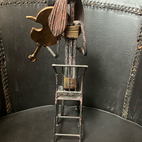 Abstract metal art cello player used