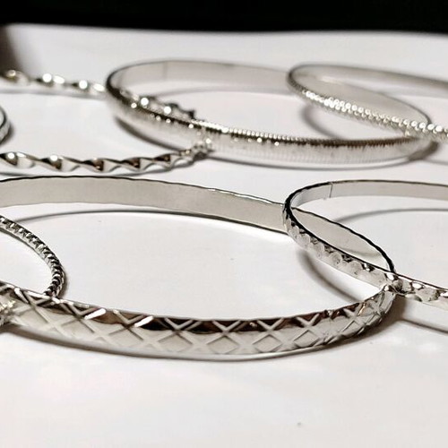 Set of 10 women's bracelets stainless steel new in gift box