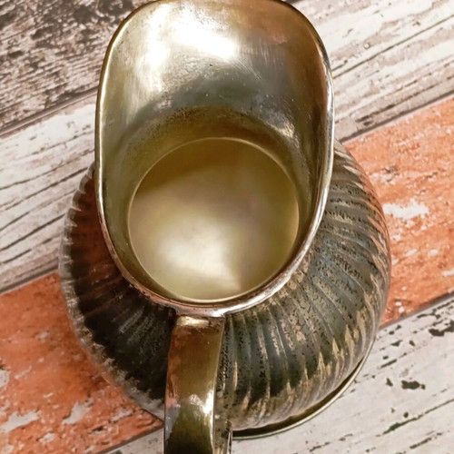 Silver-plated Art Deco jug used, brass with saucer