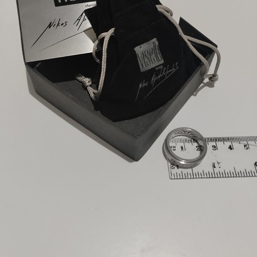 Men's ring NA with rotating band like new, gray