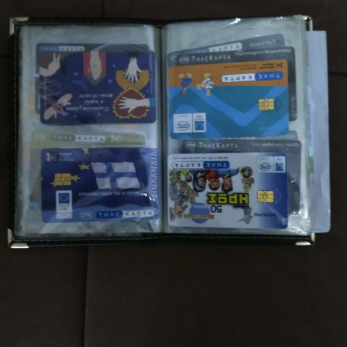 Collectible old phone cards with album used