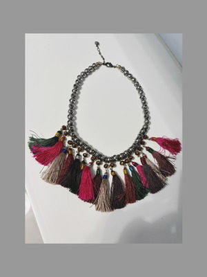 Necklace like new with colorful tassels