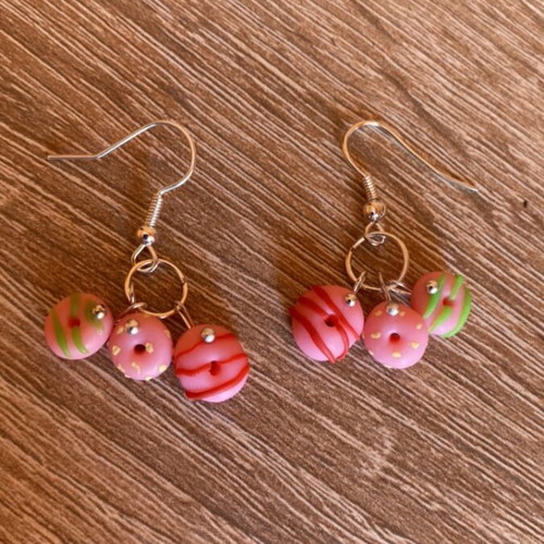 Handmade pink donut-shaped clay earrings made to order