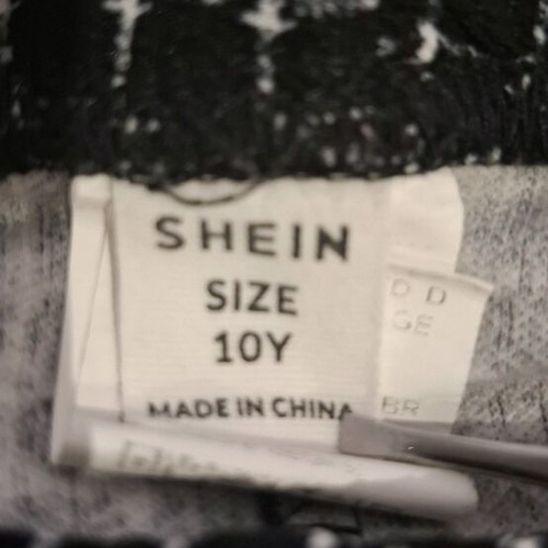Shein girls' leggings 10 years with black and white check pattern, like new