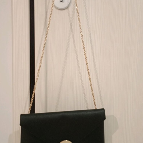 Black bag with gold chain like new
