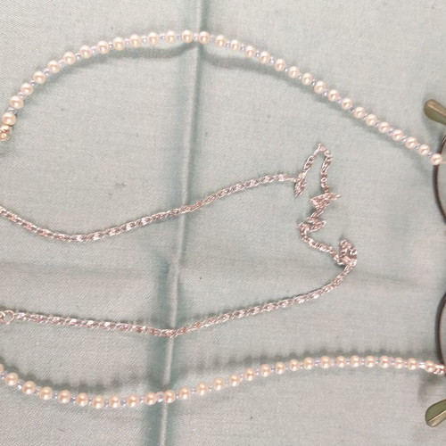 Glasses chain with white pearls and blue beads in silver color