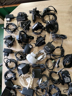Mobile phone chargers used Nokia, Sagem, Sony Ericsson with earphones