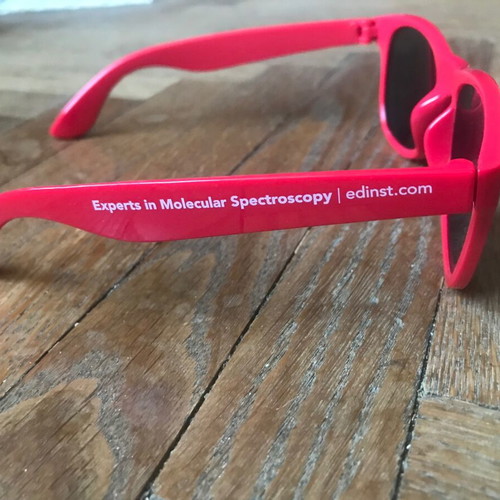 Sunglasses like new with red plastic frame
