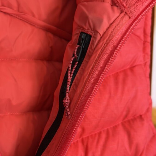 Umbro sleeveless jacket with down filling like new, red