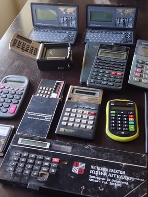Vintage calculators and electronic organizers used, pack of 12
