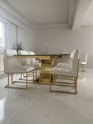 Elegant custom-made dining room set with glass table and 8 chairs