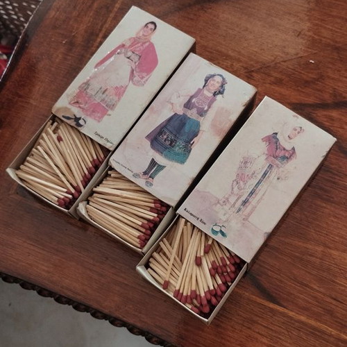 Vintage collectible matchboxes used with traditional Greek costumes
