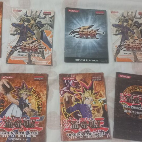Yu-Gi-Oh! rule books and deck zones, like new, set of 14 each