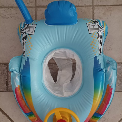 Inflatable car baby float used with leg holder