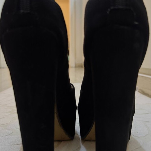 Black platforms size 36 mint condition with gold zipper