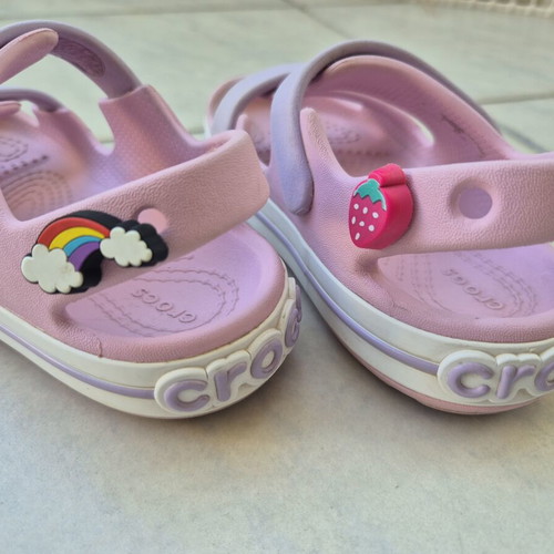 Crocs pink sandals with 3 charms, size C9