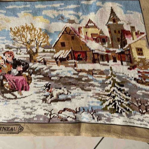 Handmade embroidered textile painting winter scene with horse