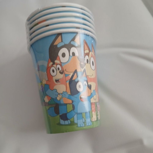 Bluey birthday party set with invitations, straws, cups, knives, and banner