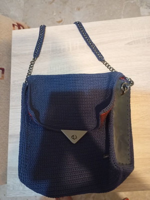 Handmade blue shoulder bag used with silver clasp and small scratch