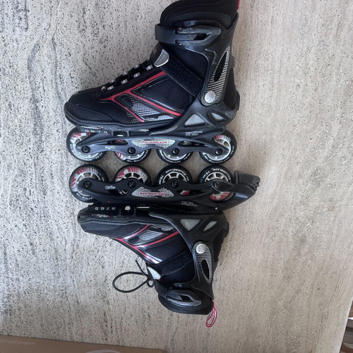 Rollerblades used, size 38.5-40.5, red with protective gear