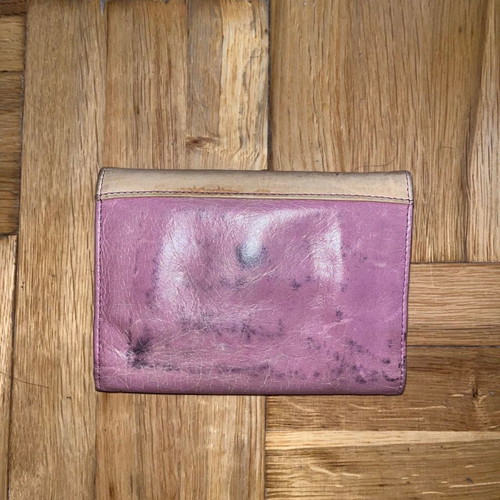 SaintClair leather wallet with wear on the back