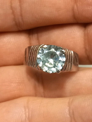 For sale by a gemstone collector, silver ring with a green HPHT diamond 5.55 ct