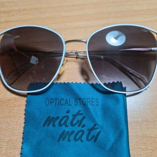 Mati Mati Lük sunglasses like new, white and brown