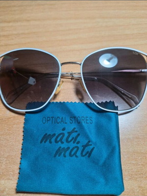 Mati Mati Lük sunglasses like new, white and brown