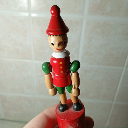 Wooden Pinocchio finger puppet used, classic decorative toy