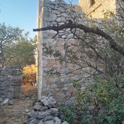 Kapetanospito building from 1876 in Areopoli Mani with sea view