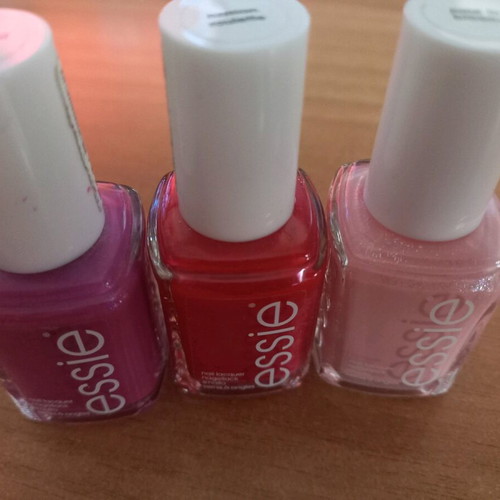 Essie nail polish in three colors like new, 2 glitters and 1 plain