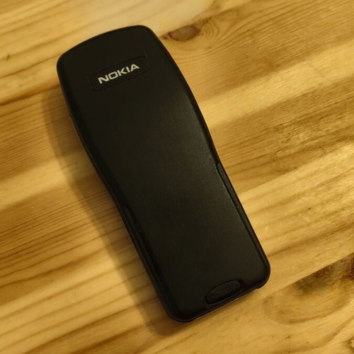 Nokia 3210 mobile phone with charger