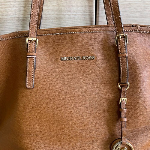 Michael Kors bag used with wear on the trim