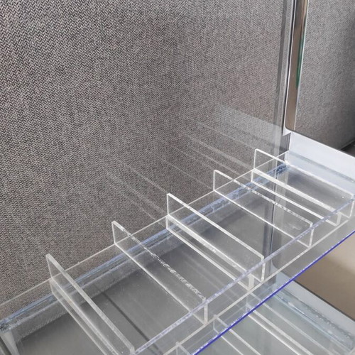 Tabletop plexiglass product display stand like new with metal decorations