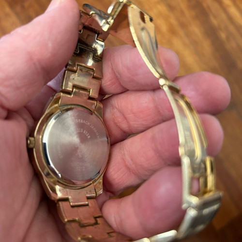 U.S. Polo Assn. women's watch used, gold with black bezel