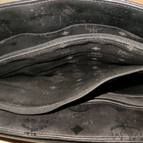 MCM shoulder bag used, black, with multiple compartments