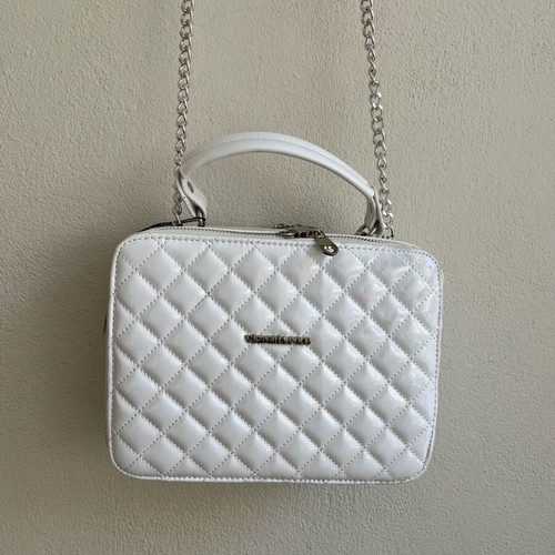 White lustrous bag with silver details and chain