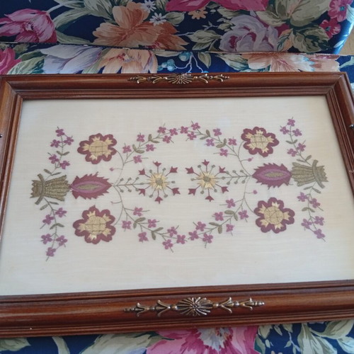 Decorative wooden tray with embroidered flowers and brass handles