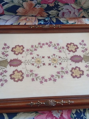 Decorative wooden tray with embroidered flowers and brass handles