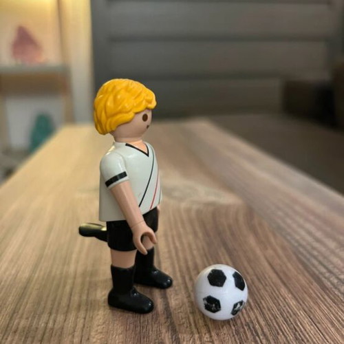 Playmobil footballer like new with faded ball